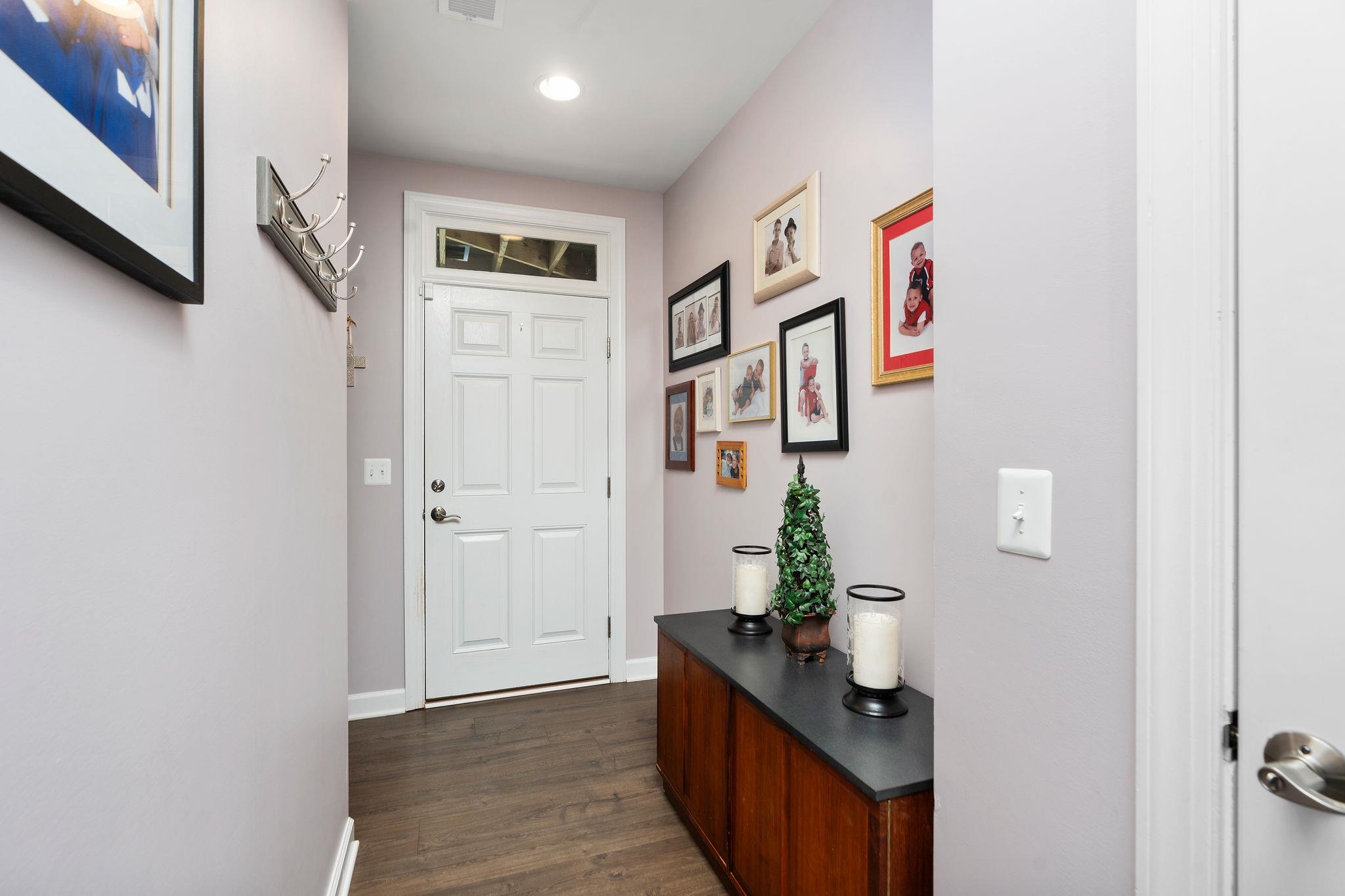 1644 Delphi Drive Charlottesville, VA 22911 - Photo 35 of 39 a living room with furniture and wooden floor