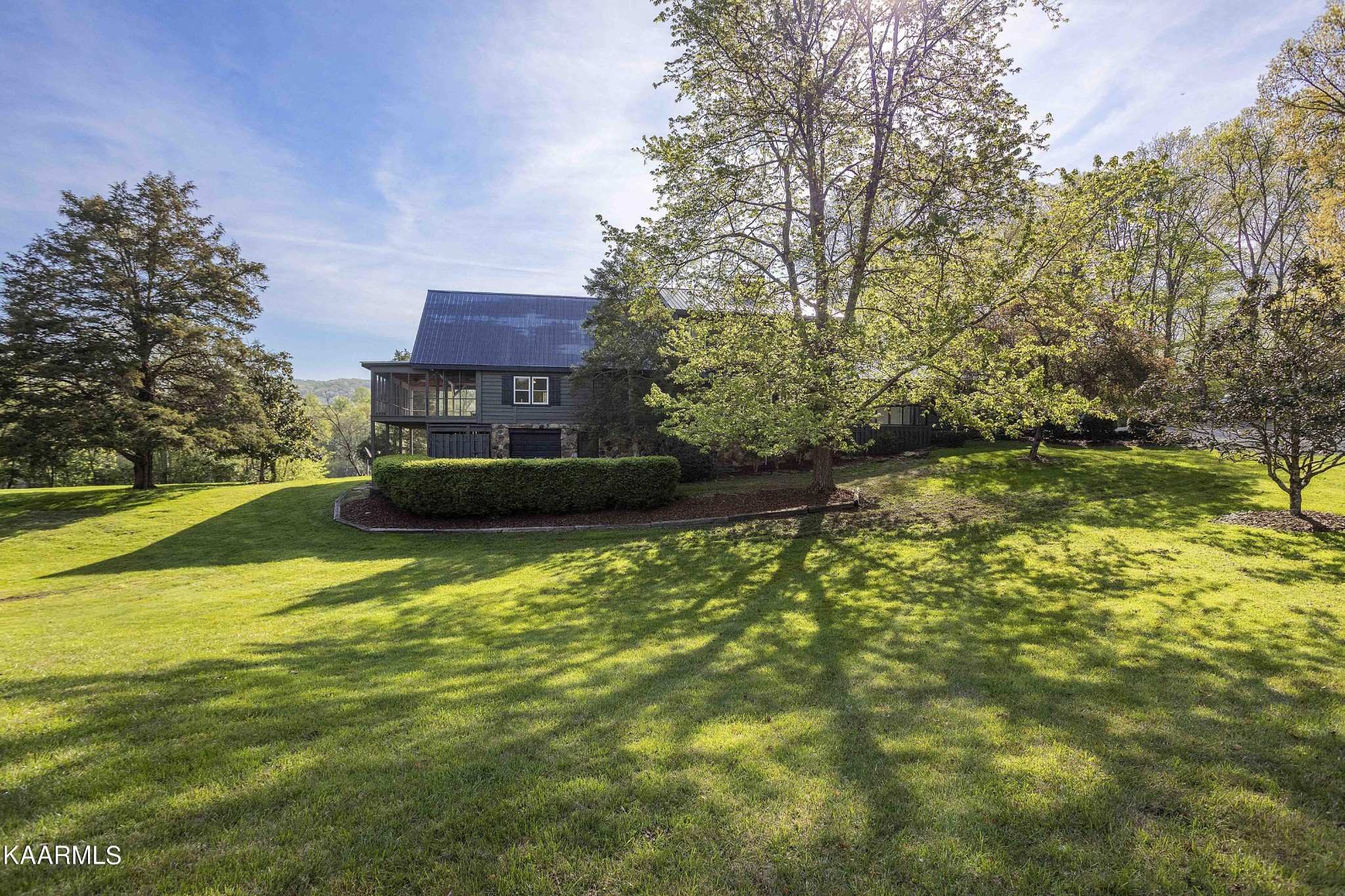 2532 Jones Road Lenoir City, TN 37771 - Photo 4 of 9 a view of a large body of water with a building in the background