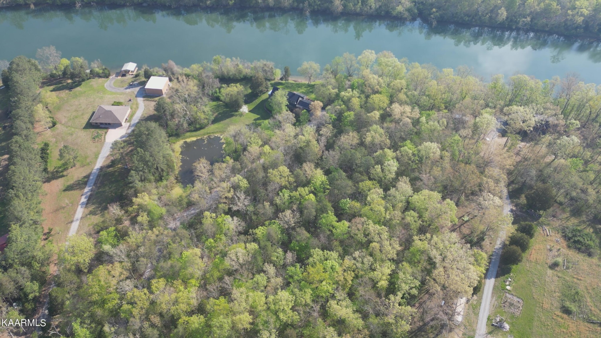 2532 Jones Road Lenoir City, TN 37771 - Photo 6 of 9 a backyard of a house with lots of green space