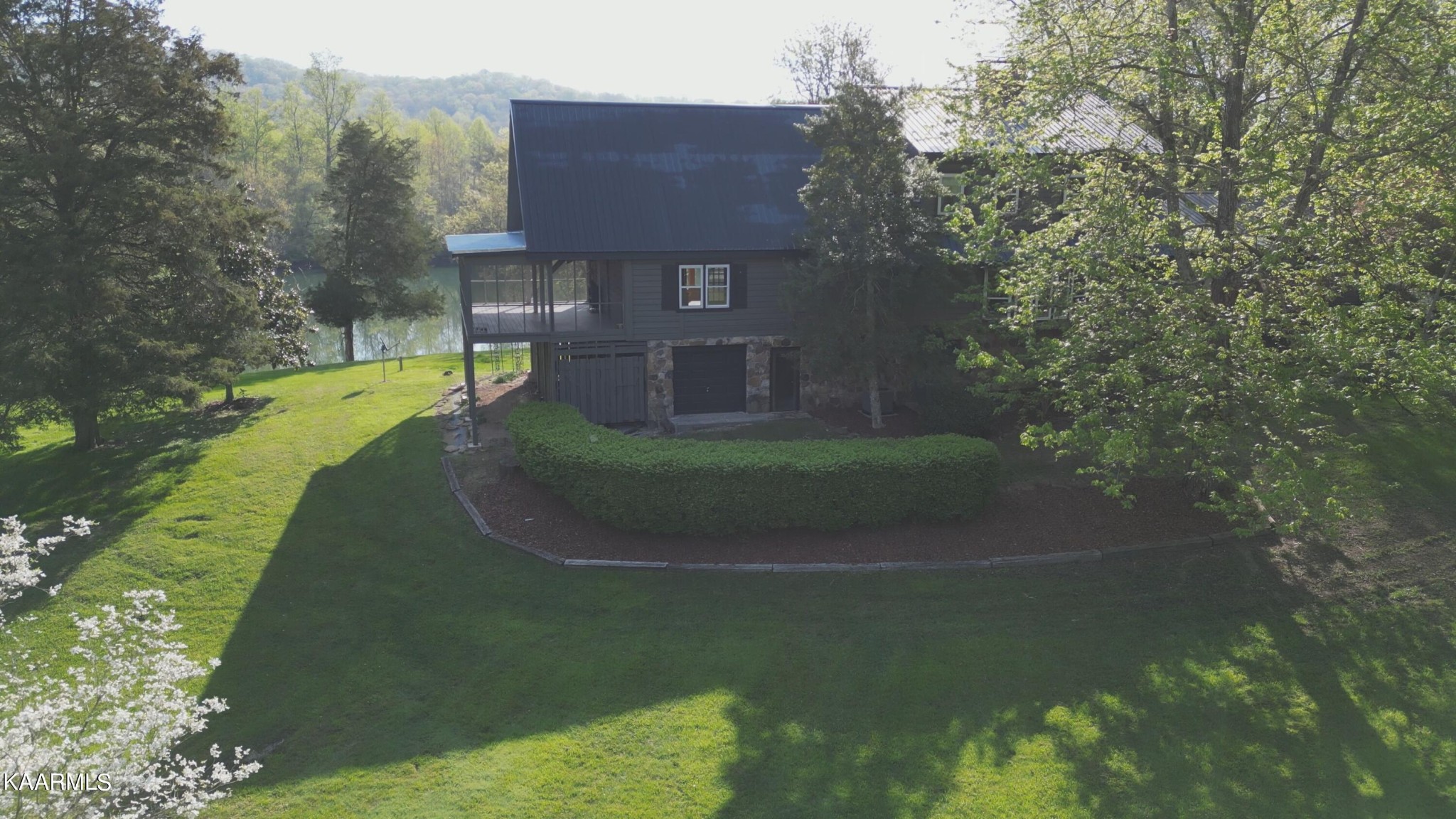 2532 Jones Road Lenoir City, TN 37771 - Photo 8 of 9 a view of a house with a yard