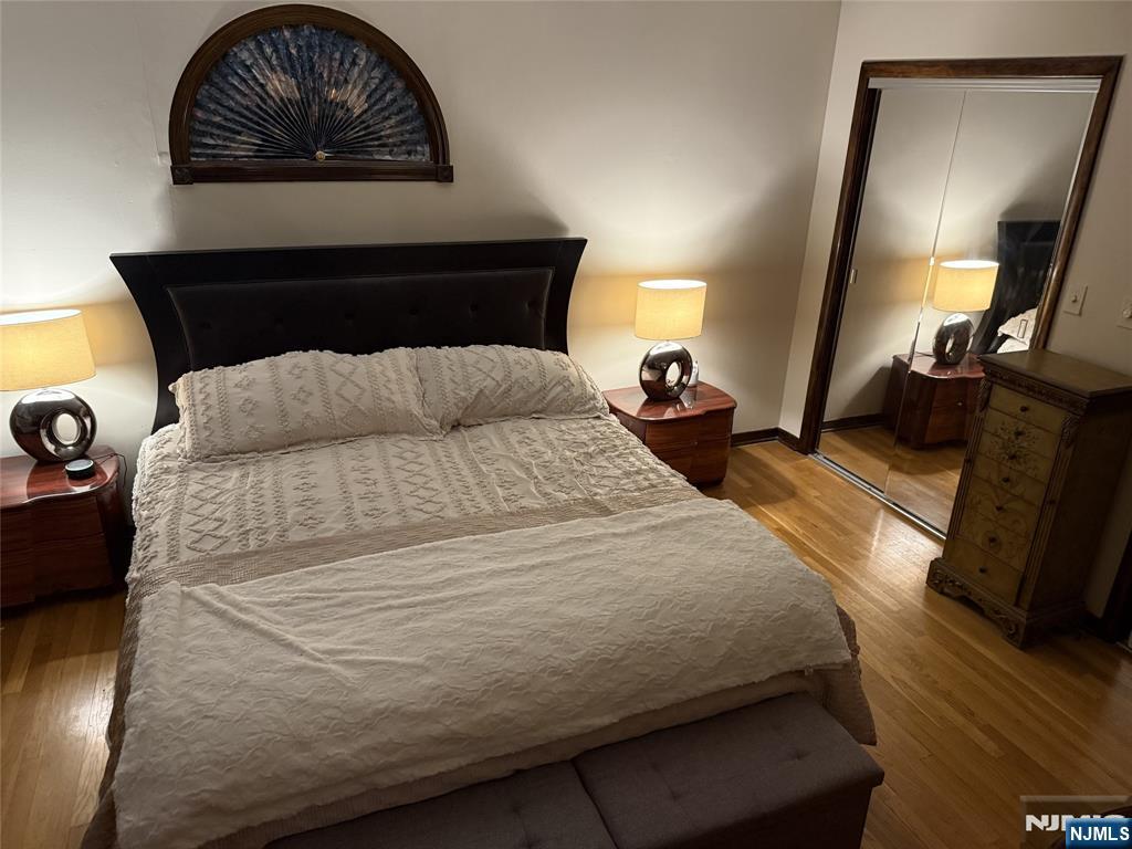 36 Lavina Trail Oak Ridge, NJ 07438 - Photo 19 of 26 a bedroom with a bed and a mirror