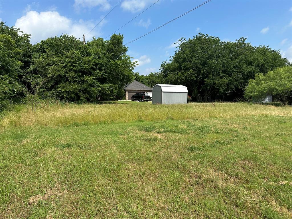 664 Gould Street Pilot Point, TX 76258 - Photo 1 of 3 a house view with a outdoor space