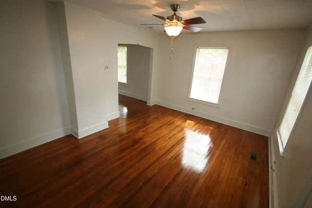 a picture of a bathroom with a shower