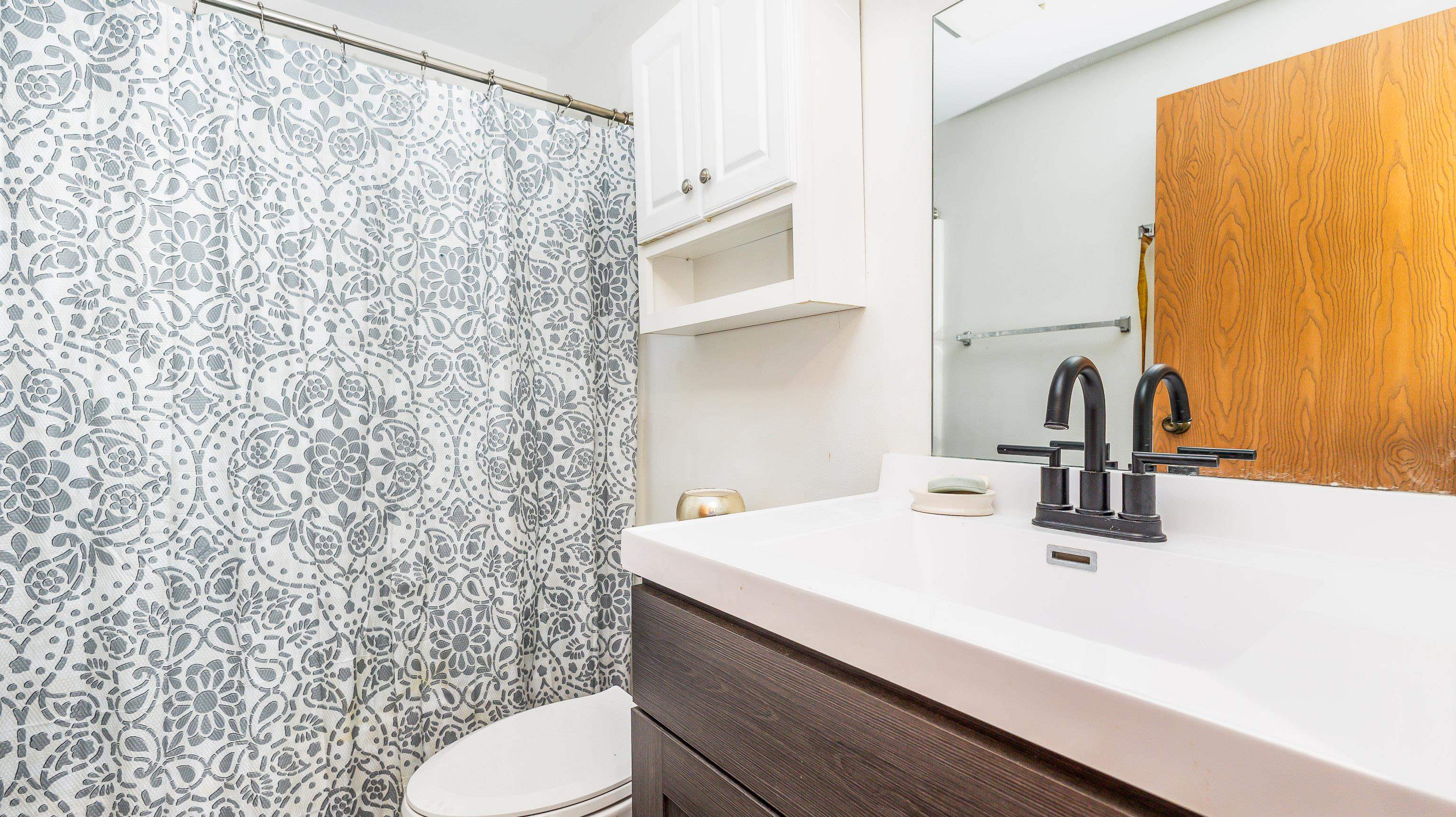 10-a125 E Apple Canyon Road Apple River, IL 61001 - Photo 16 of 29 a bathroom with a sink and a mirror