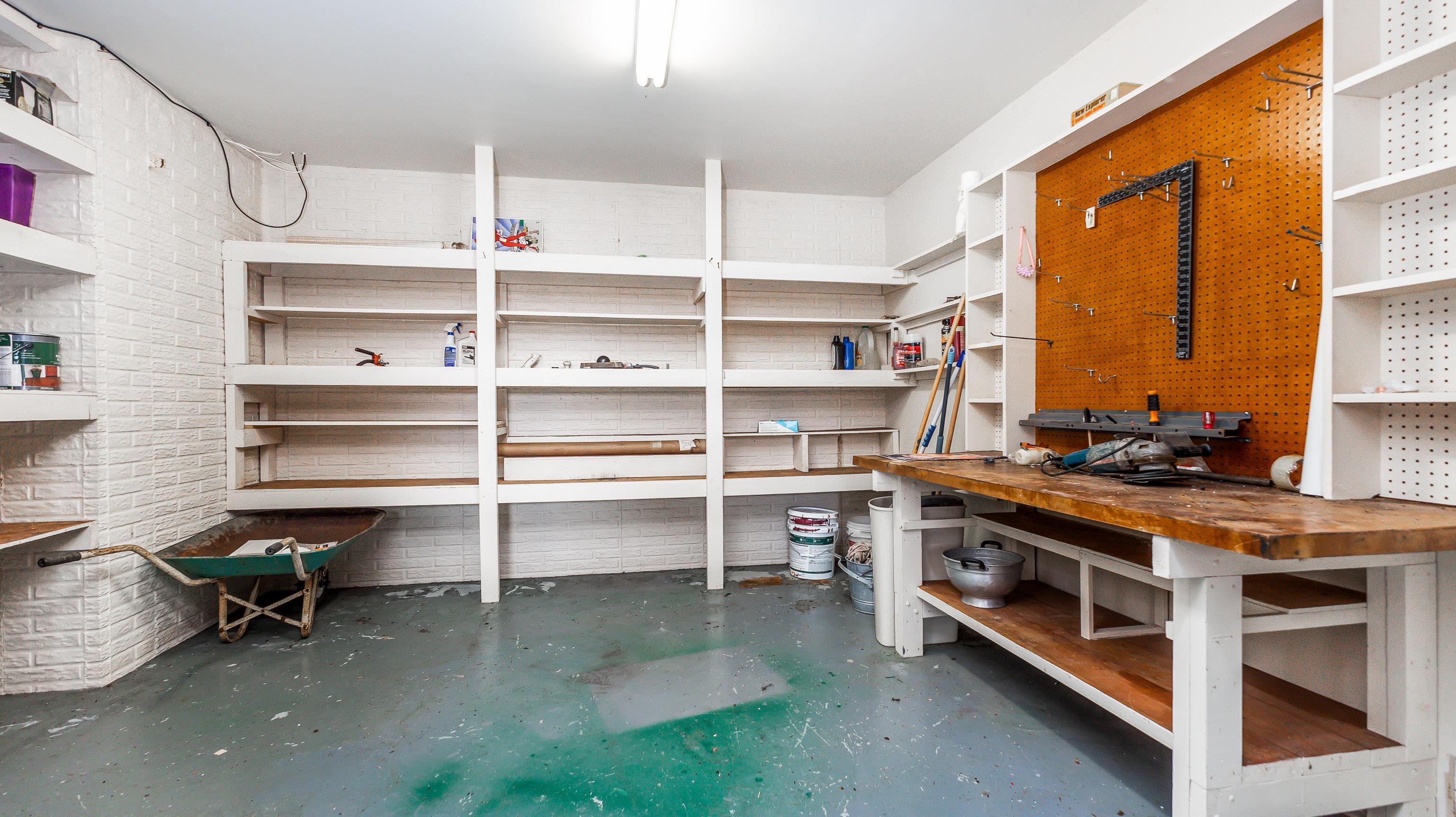 10-a125 E Apple Canyon Road Apple River, IL 61001 - Photo 21 of 29 a view of a room with shelves and a window