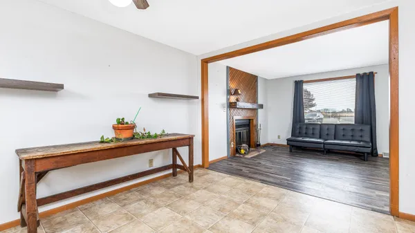 a room that has a bed and a window in it