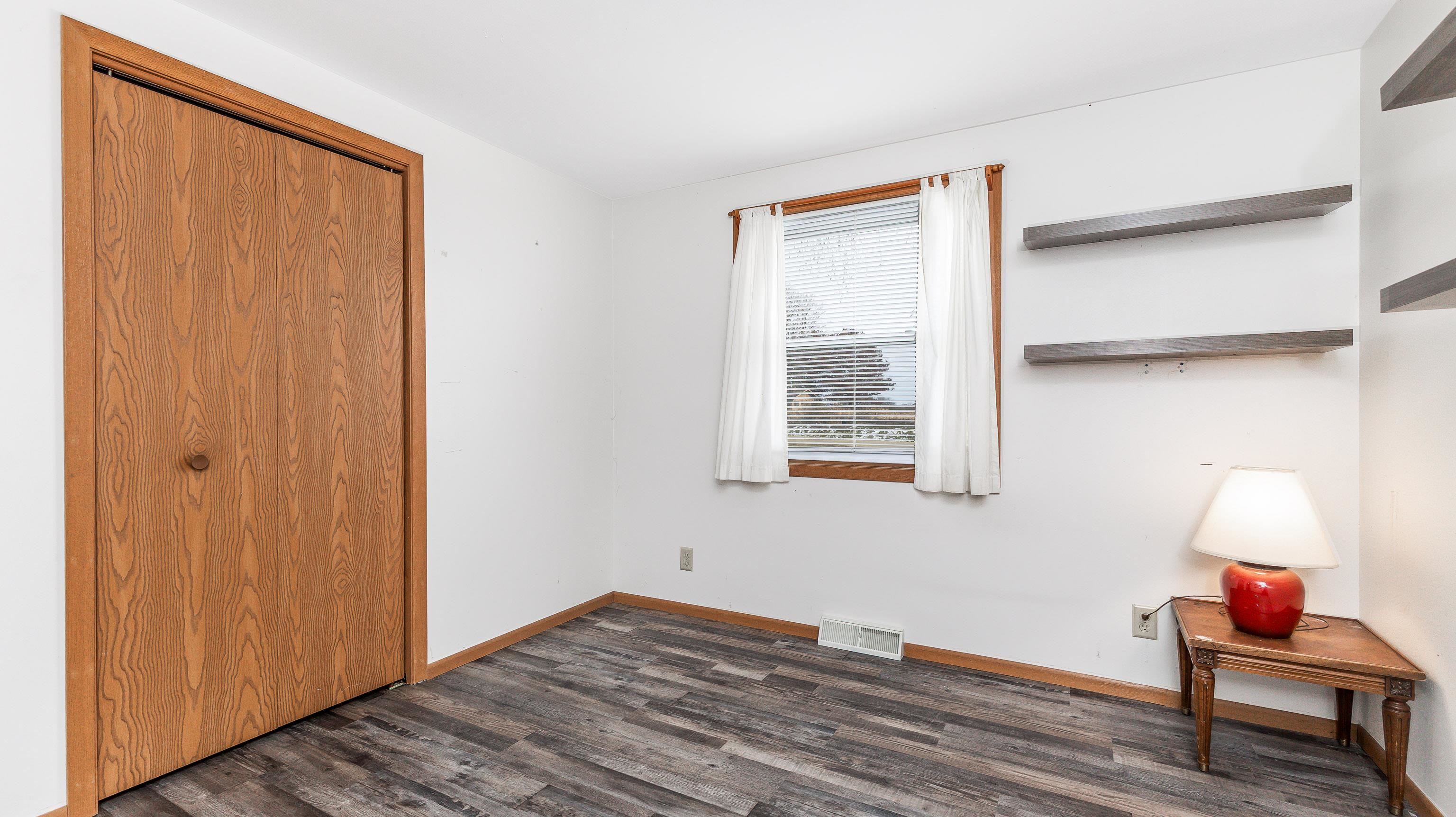 10-a125 E Apple Canyon Road Apple River, IL 61001 - Photo 10 of 29 a room that has a bed and a window in it
