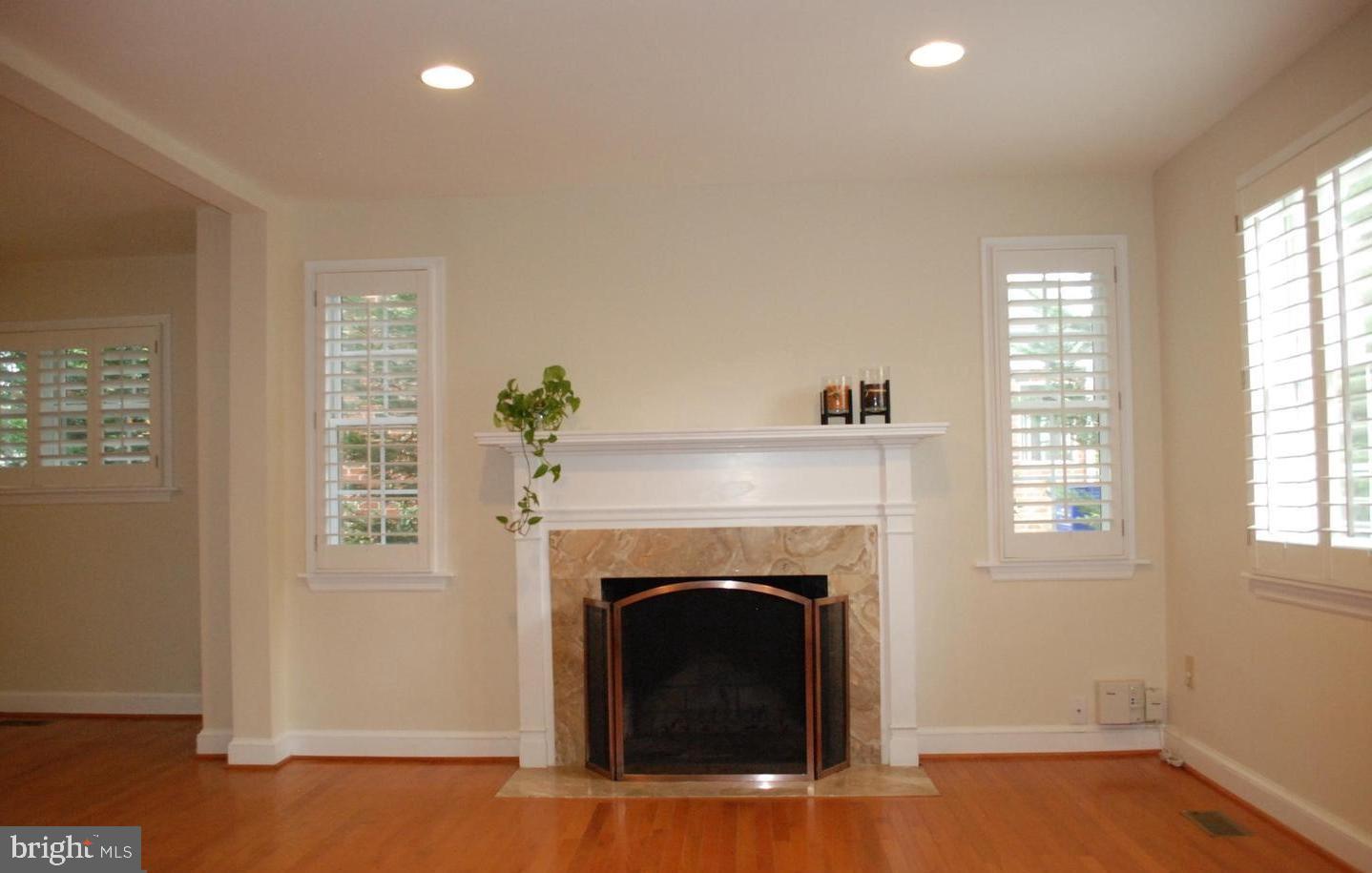 5511 Greentree Road Bethesda, MD 20817 - Photo 4 of 26 Living Room Fireplace