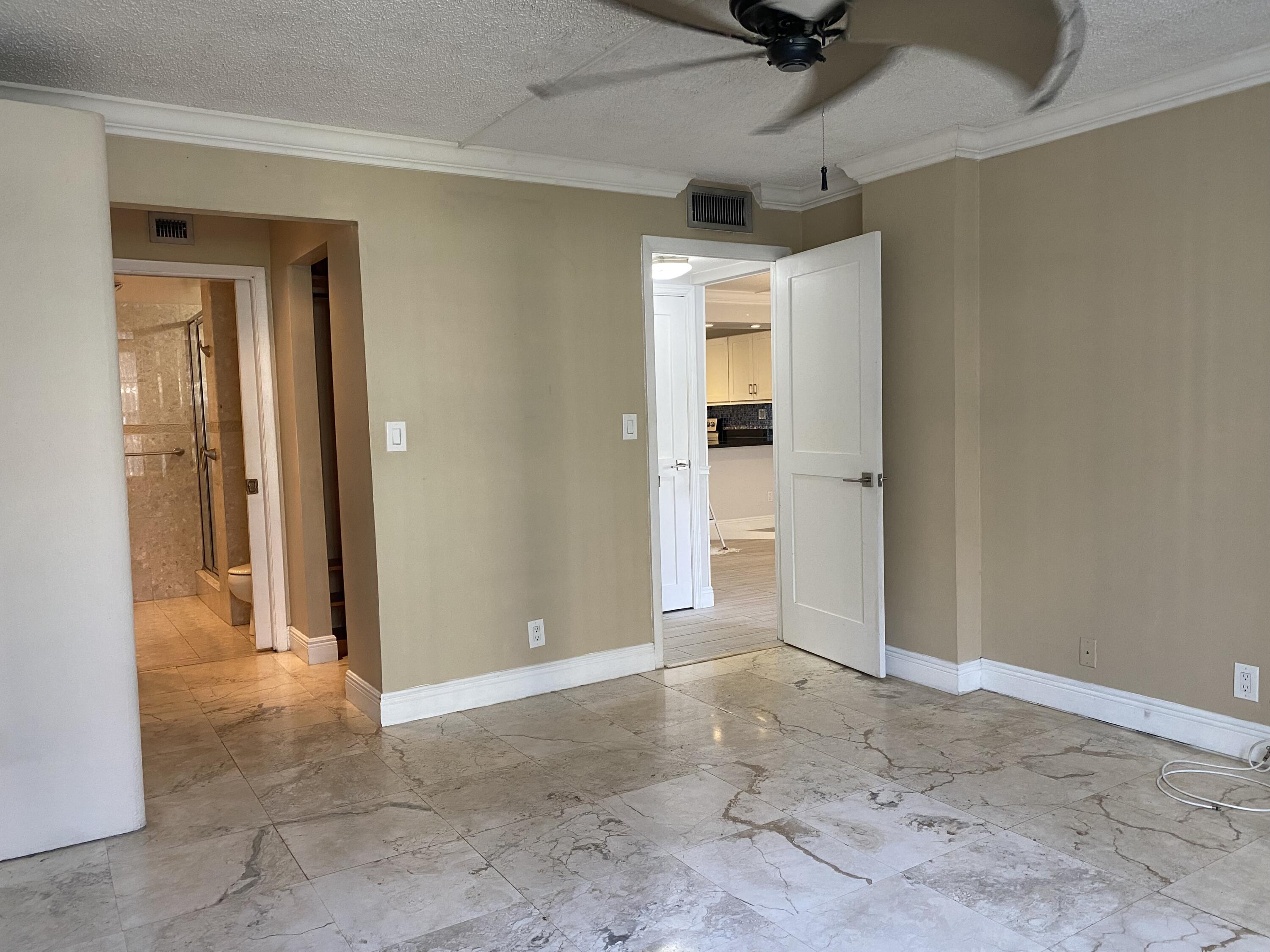 15 Royal Palm Way, Unit 107 Boca Raton, FL 33432 - Photo 13 of 44 Primary Bedroom