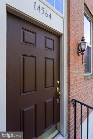 a view of a brick house with a door