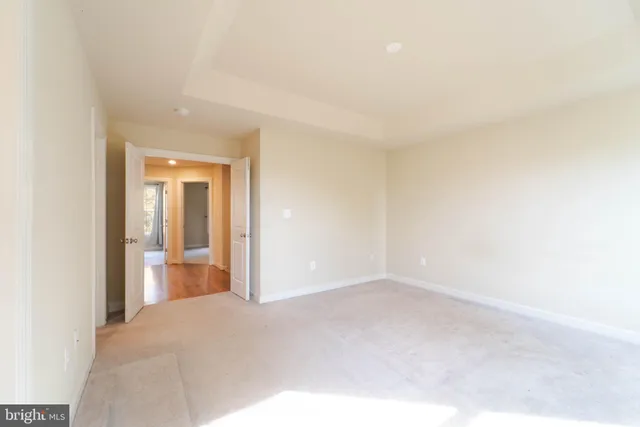a bathroom with a bathtub and window