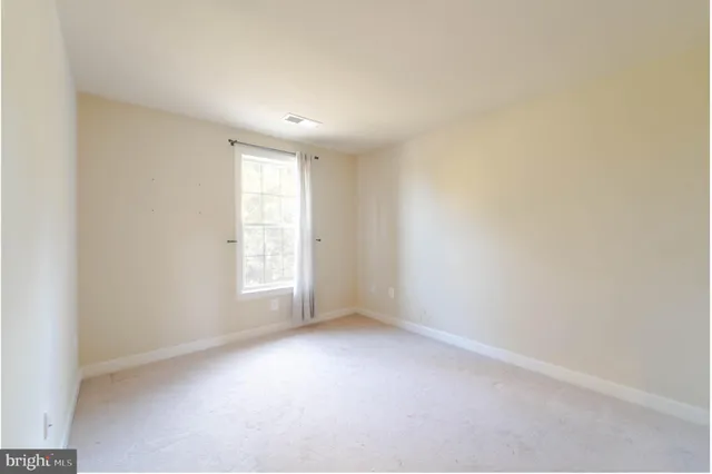 a front view of a house with a porch