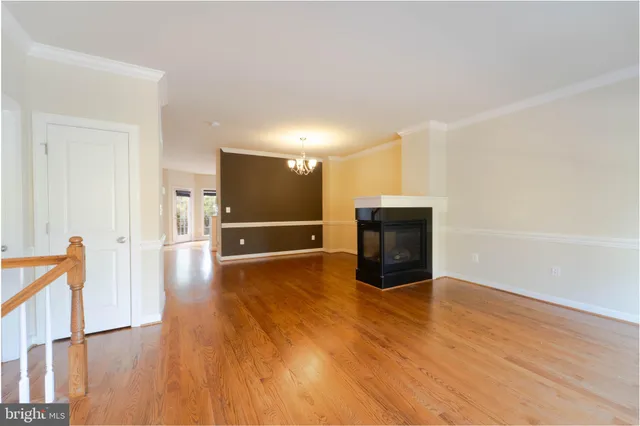 a view of a livingroom with wooden floor