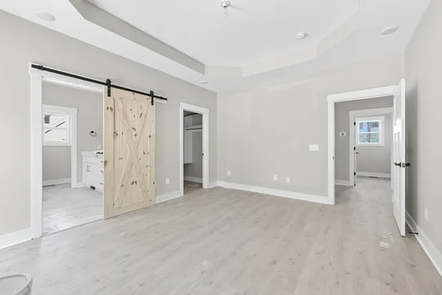 a view of a bathroom with a shower and a sink
