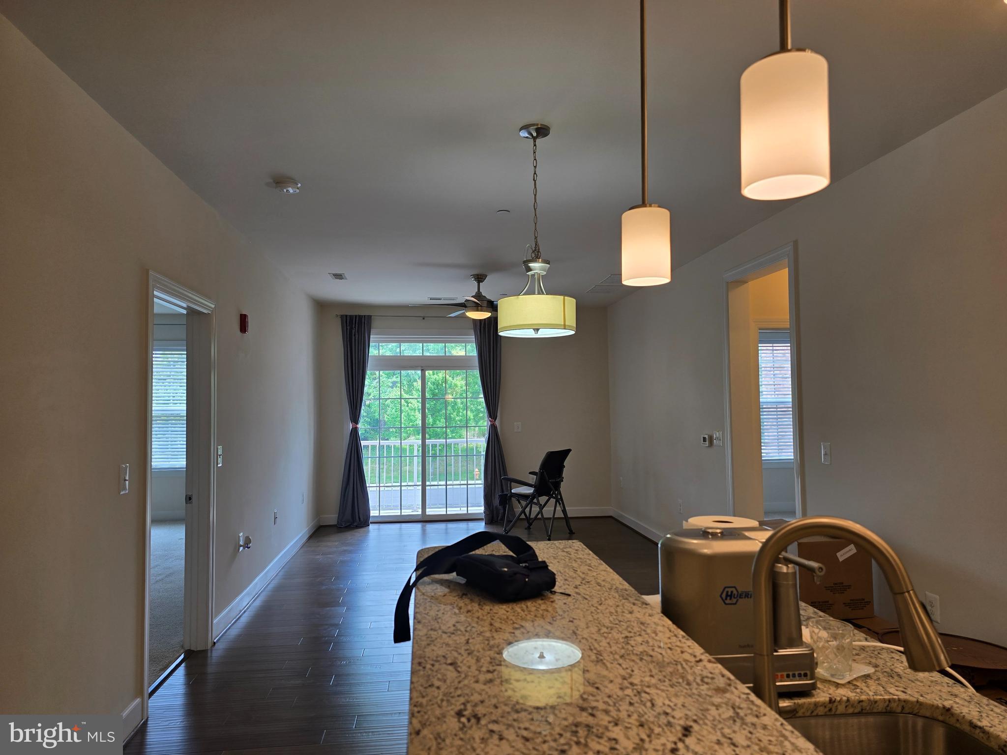 10530 Resort Road, Unit 101 Ellicott City, MD 21042 - Photo 4 of 13 a room with furniture and a window