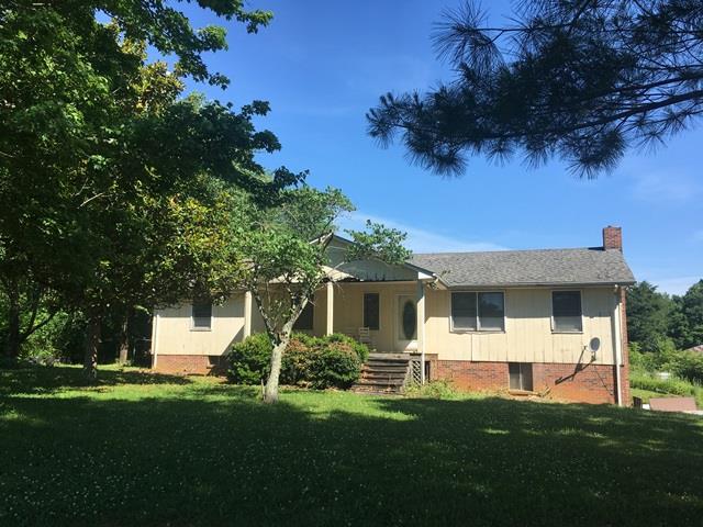 Front of home on 3.78 acres, needs your TLC!  
