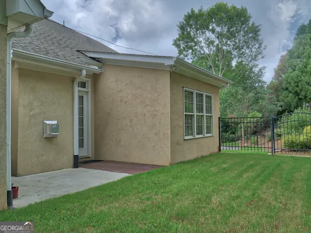 a house with a tree in front of a house