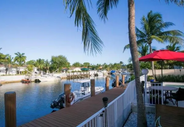 a view of a lake with a terrace outdoor space