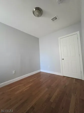 a kitchen with stainless steel appliances a stove a microwave and sink