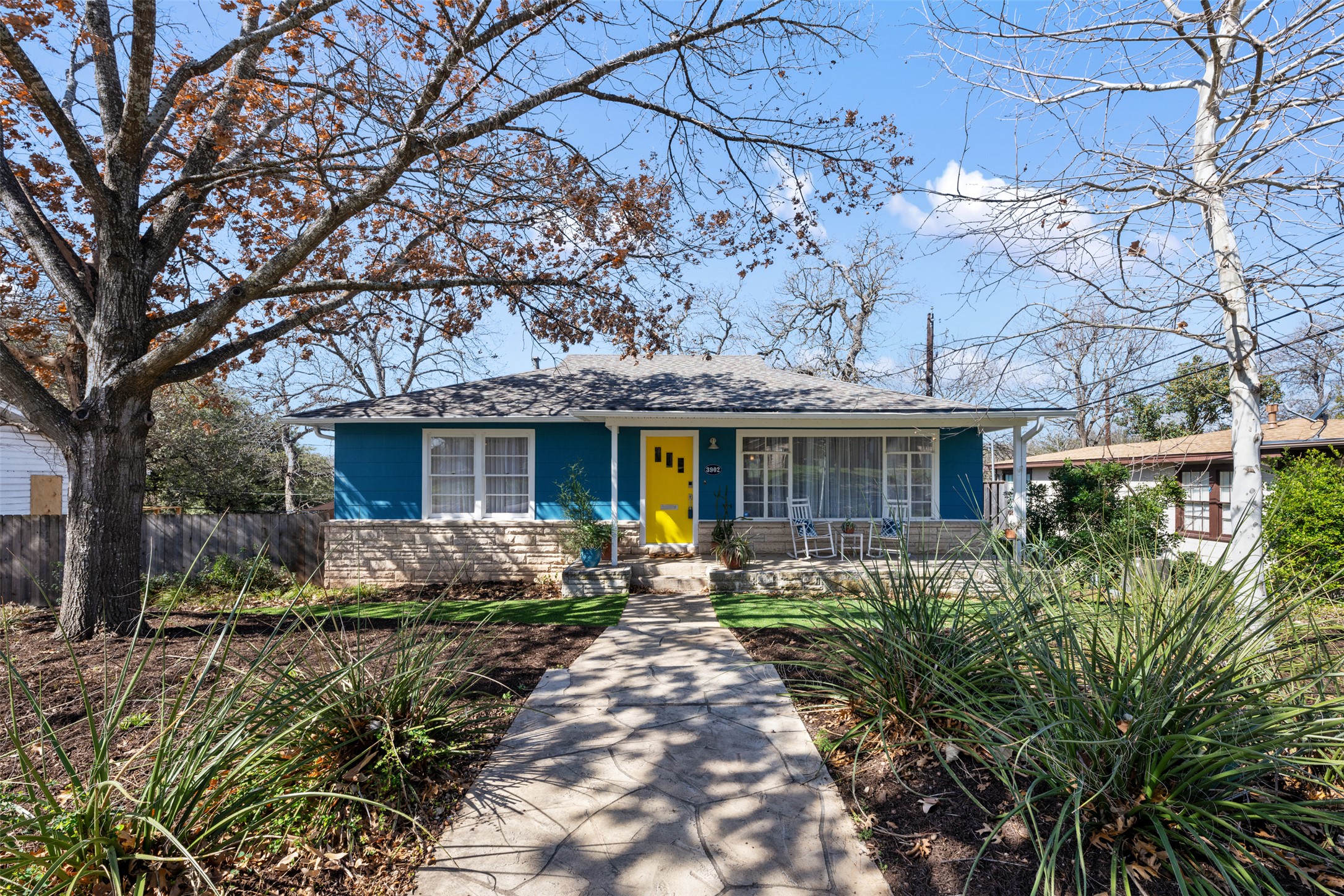 3902 Brookview Road Austin, TX 78722 - Photo 1 of 1 Fully landscaped yard with custom terracing, retaining walls, native plants, and sprinkler system