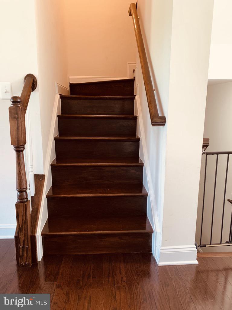 7660 Elmcrest Road Hanover, MD 21076 - Photo 20 of 56 Hardwood Floors and Stairs