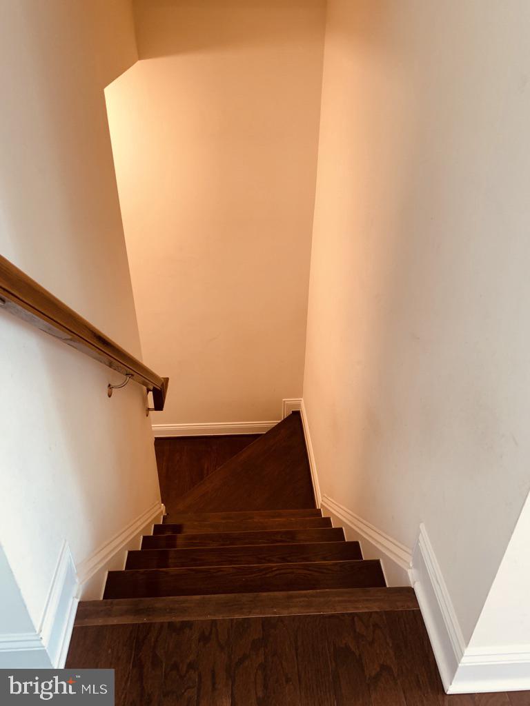 7660 Elmcrest Road Hanover, MD 21076 - Photo 21 of 56 Hardwood Floors and Stairs to Bedrooms