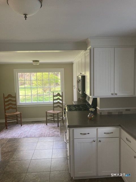 88 Knox Road Litchfield, CT 06759 - Photo 11 of 28 a kitchen with a sink and cabinets