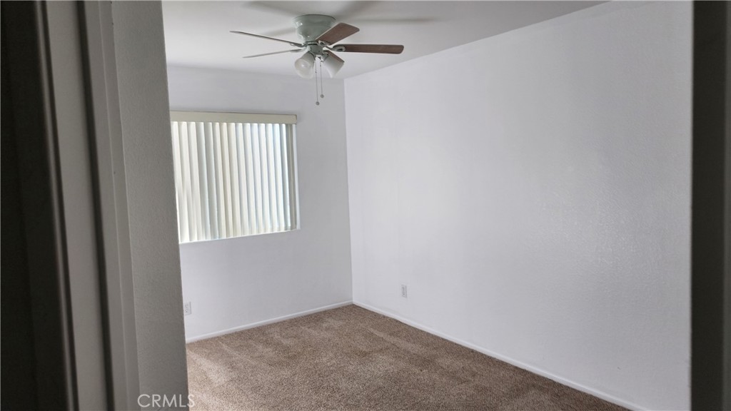 1496 Dusty Hill Road Hemet, CA 92545 - Photo 7 of 31 a view of a window in a room