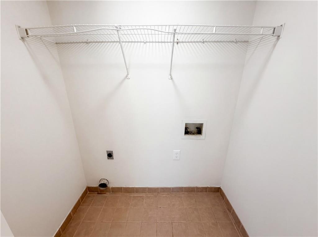 722 Ridgetop Road Bethlehem, GA 30620 - Photo 20 of 23 a view of a room with racks on the wall