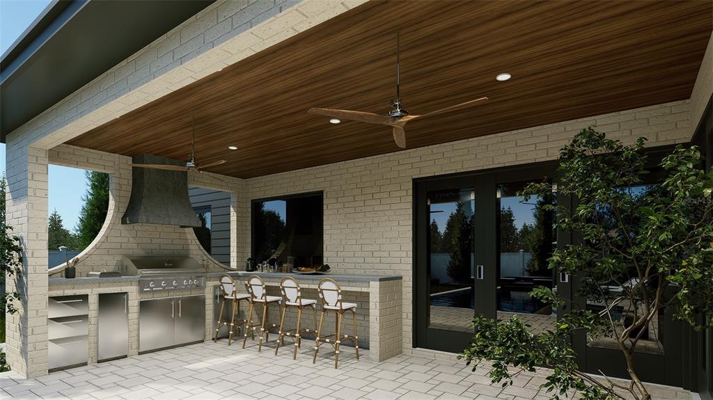 4013 West Inman Avenue Tampa, FL 33609 - Photo 3 of 8 a group of people sitting in patio of a house