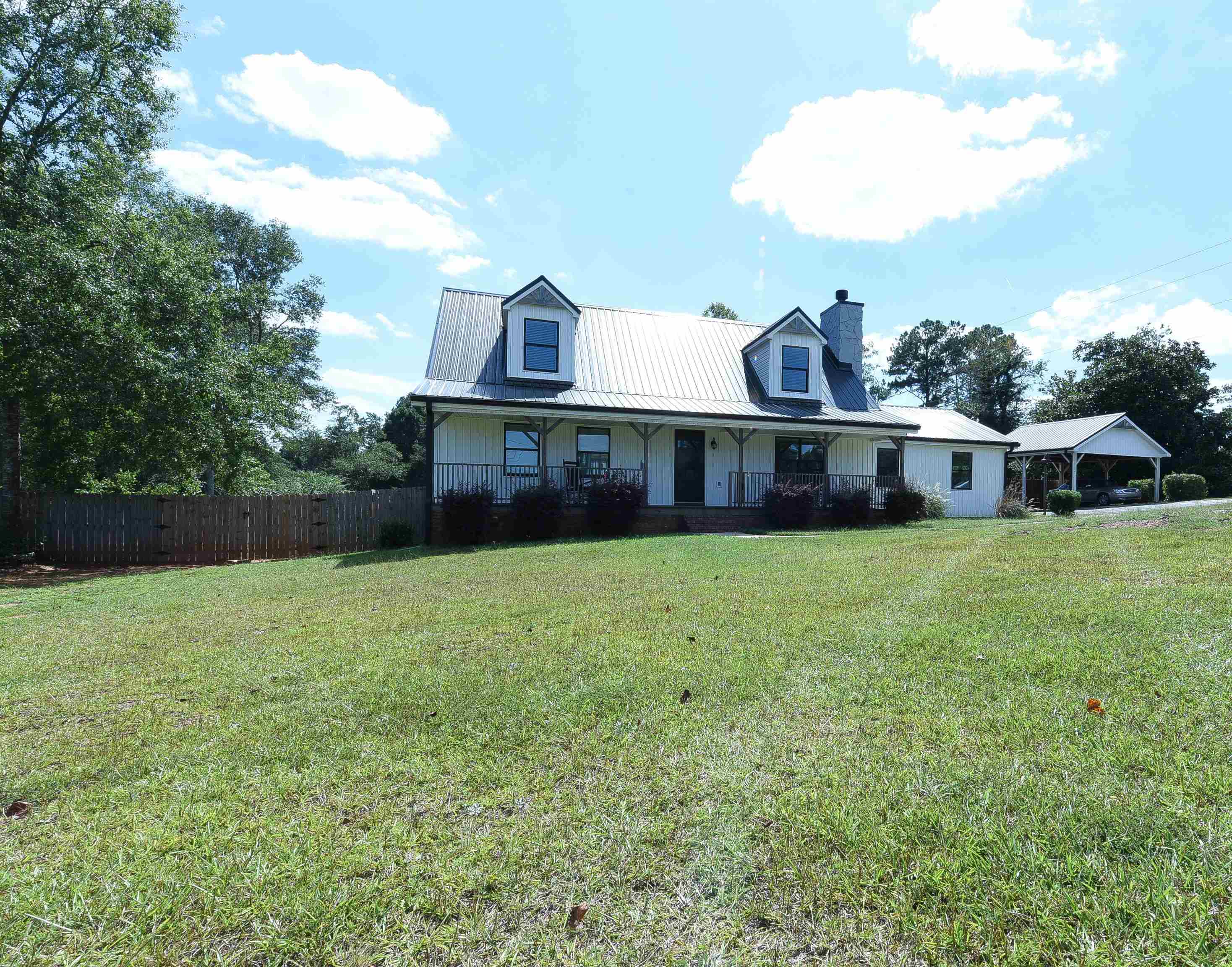 4 Briar Ridge Road Newnan, GA 30263 - Photo 1 of 1 a view of a house with a yard