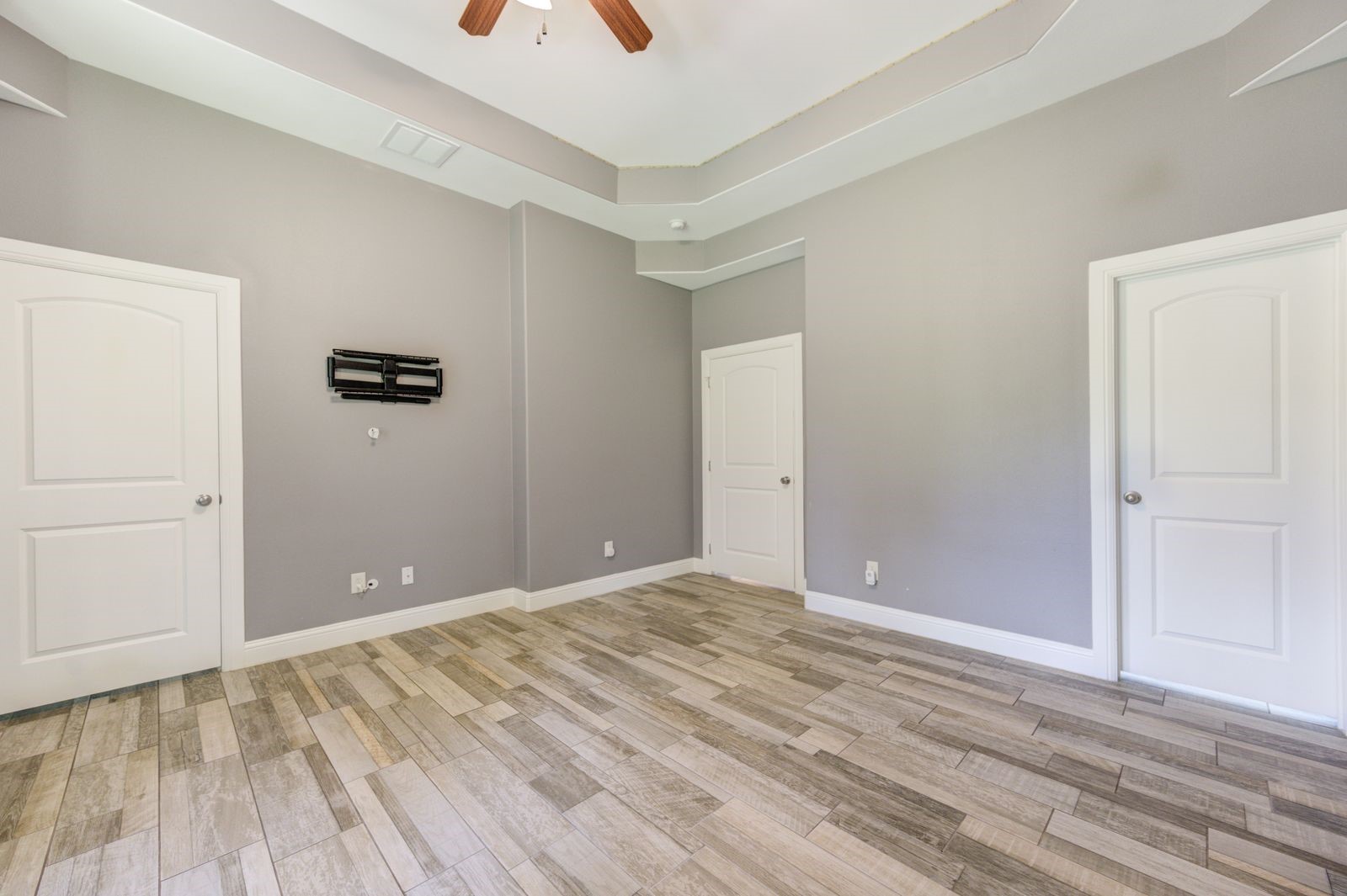 21038 Angus Drive Cleveland, TX 77328 - Photo 40 of 49 a view of room with wooden floor