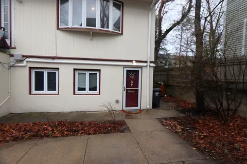 a house with trees in front of it