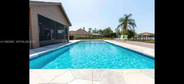 a view of swimming pool from a balcony