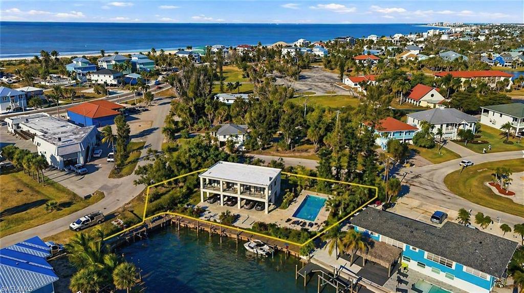 75 Mound Road Fort Myers Beach, FL 33931 - Photo 1 of 21 an aerial view of multiple house