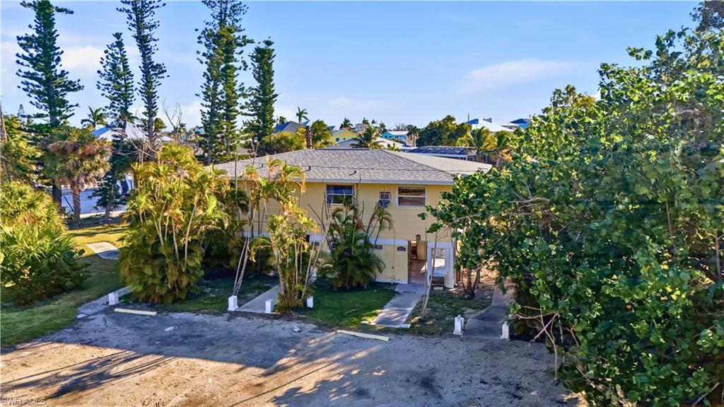 75 Mound Road Fort Myers Beach, FL 33931 - Photo 13 of 20 a view of a park with plants and trees