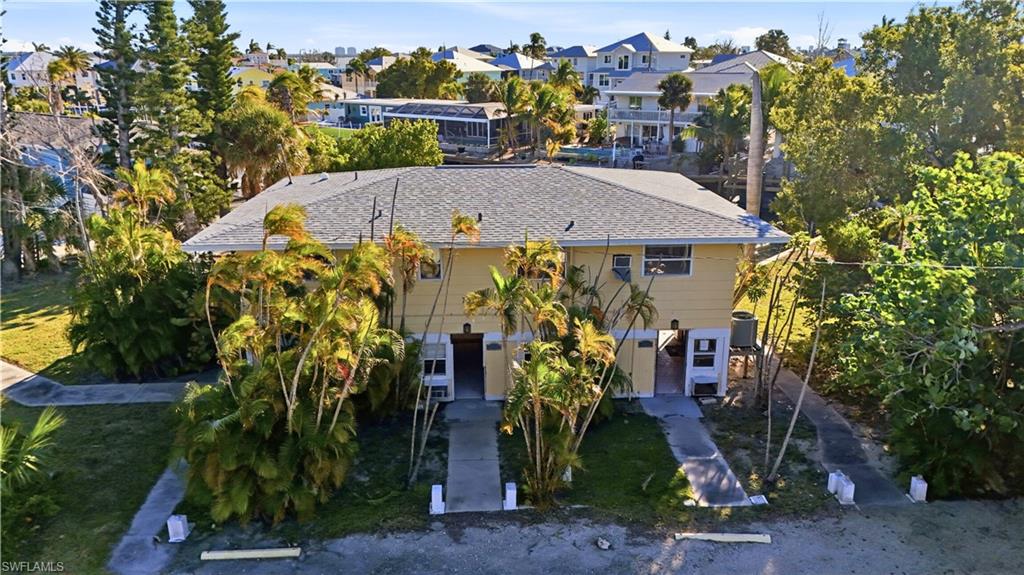 75 Mound Road Fort Myers Beach, FL 33931 - Photo 15 of 21 a view of a house with a yard