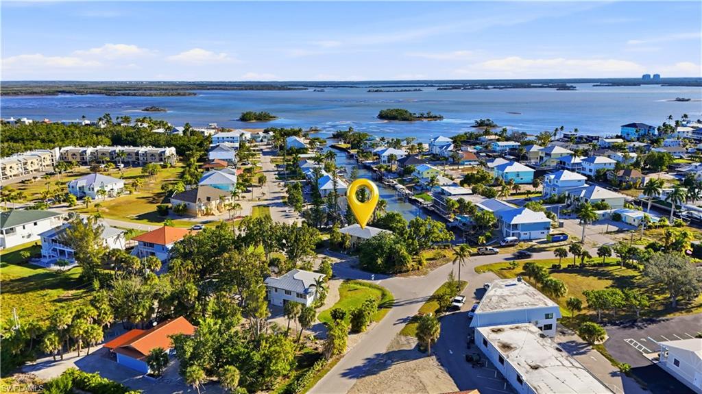 75 Mound Road Fort Myers Beach, FL 33931 - Photo 20 of 21 an aerial view of ocean and residential houses with outdoor space