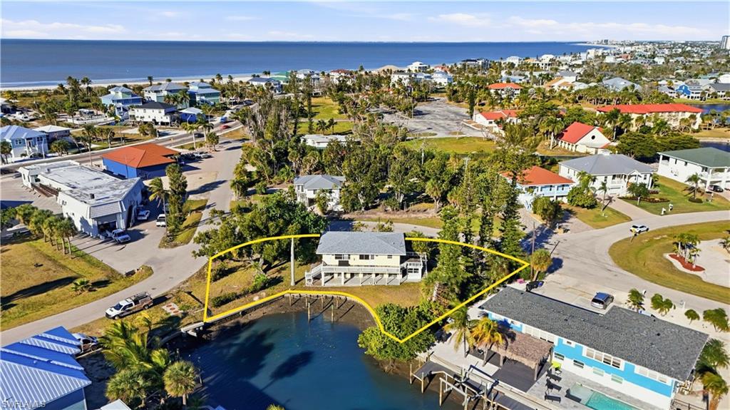 75 Mound Road Fort Myers Beach, FL 33931 - Photo 2 of 21 an aerial view of residential houses with outdoor space