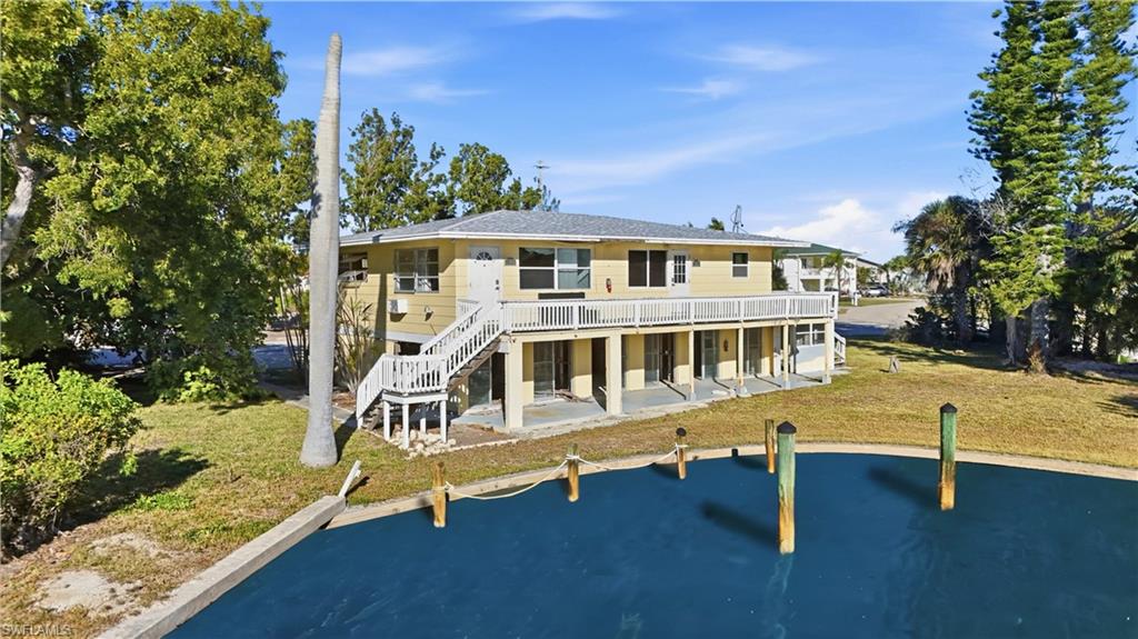 75 Mound Road Fort Myers Beach, FL 33931 - Photo 6 of 20 a house view with a outdoor space