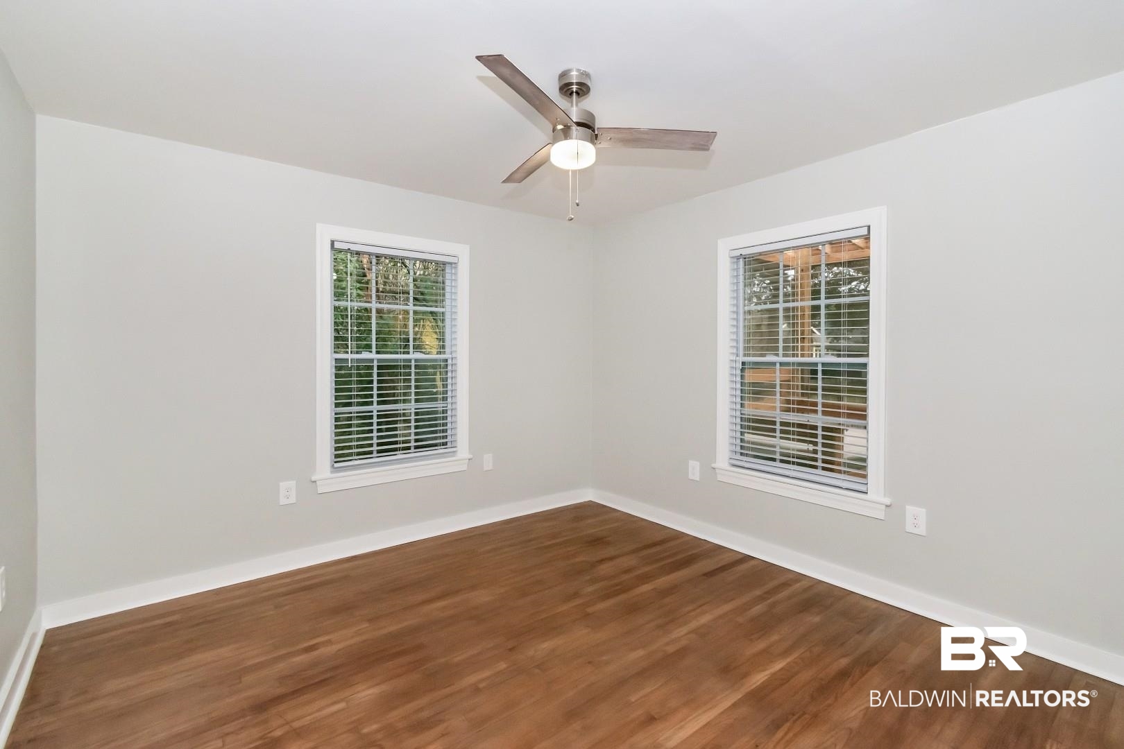 2157 Homewood Street Mobile, AL 36606 - Photo 24 of 36 Spare room with ceiling fan, baseboards, and wood finished floors