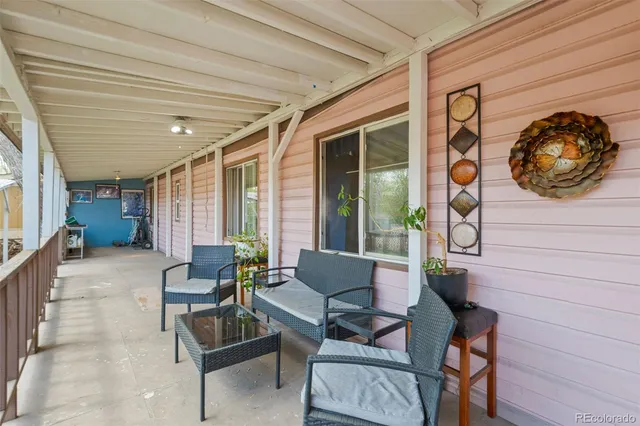 a outdoor living space with furniture and garden view