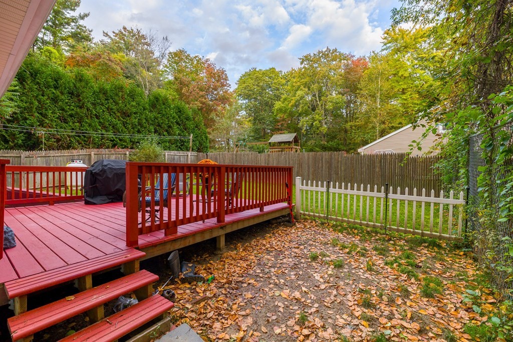 31 Reid Road Douglas, MA 01516 - Photo 19 of 31 a view of a deck with a yard