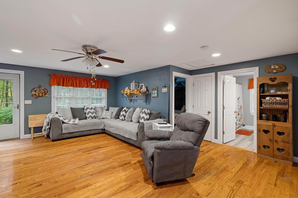 31 Reid Road Douglas, MA 01516 - Photo 5 of 31 a living room with furniture and a flat screen tv