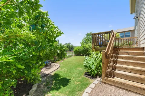 a view of swimming pool with a yard
