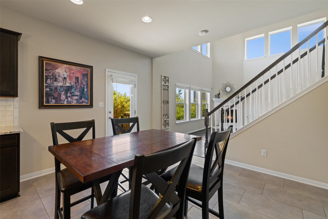 609 Stone View Trail Austin, TX 78737 - Photo 32 of 36 a view of a dining room with furniture
