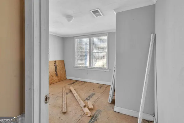 a view of livingroom with furniture and window