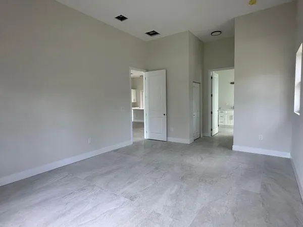 an empty room with windows