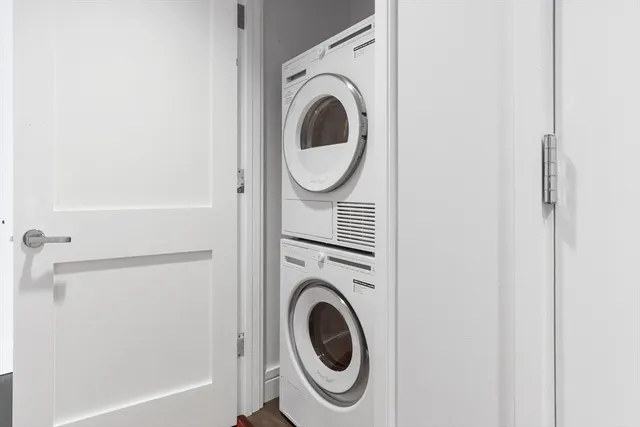 a bathroom with a toilet sink and shower
