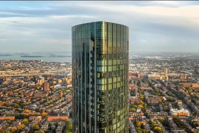 a view of a city with tall buildings